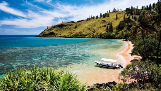 Beach on the island of taravai in the gambier archipelago by philippe bacchet